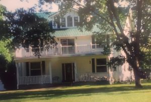 The farmhouse. It looks a lot better now than it did 65 years ago.