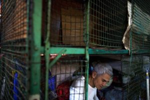 And now? Thousands of poor people in Hong Kong love in wire cage homes.